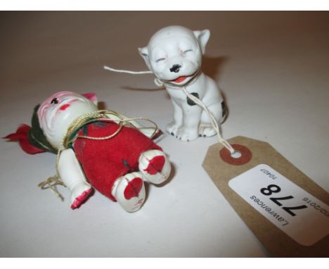 Small bisque figure of Bonzo and a similar small plastic puppet