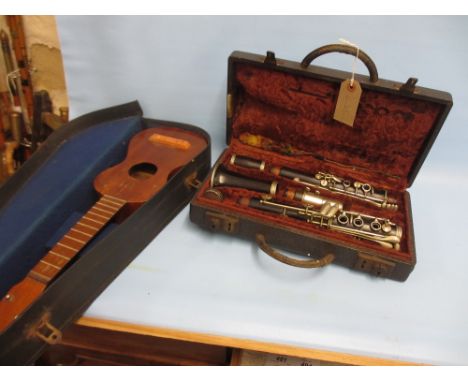 Selmer cased clarinet together with a cased ukelele 