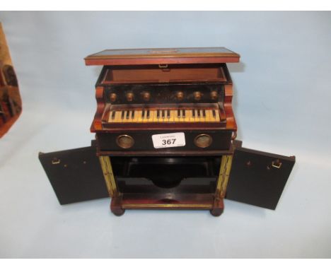 Unusual late 19th or early 20th Century musical box in the form of a pedal harmonium