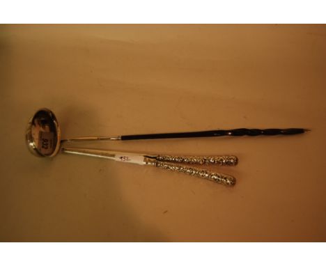 George III silver toddy ladle with twisted whale bone handle together with a pair of glove stretchers