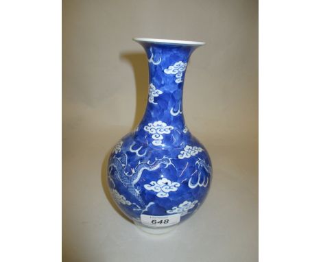 Chinese blue and white baluster form vase decorated with a dragon, signed with four character mark to base