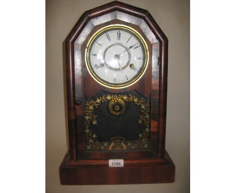 19th Century American mantel clock, the gilt decorated glass door enclosing an enamel dial with Roman numerals and two train 