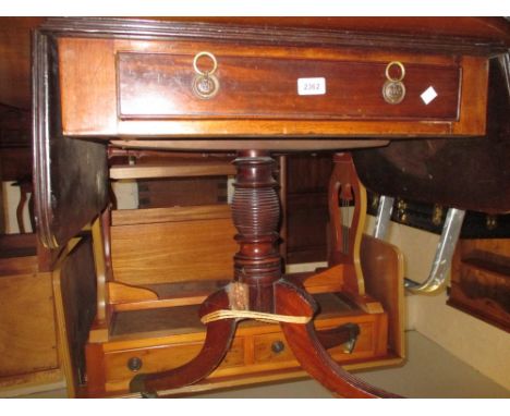 19th Century mahogany single drawer drop-leaf sofa table, having ring turned central column, acanthus leaf reeded, carved and