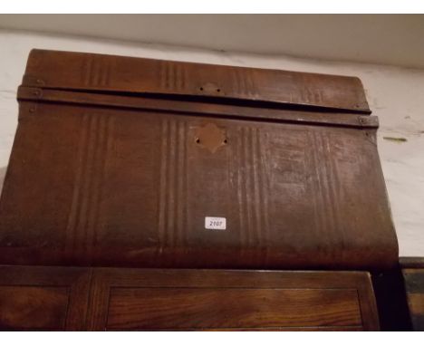 19th Century faux wood painted tin dome top trunk, together with a modern ply board trunk and a blue rexine covered trunk