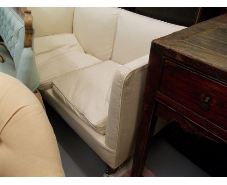 Small Victorian two seater sofa on low turned supports