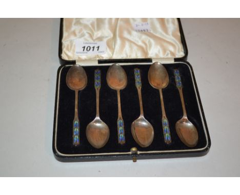 Set of six Birmingham silver blue and green enamel decorated coffee spoons in fitted box, makers mark S Ltd.