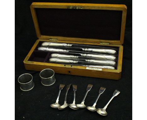 A Carrington & Co. of 130 Regent Street silver pistol grip handled carving knife set (by Harrison Bros & Howson, Sheffield 18