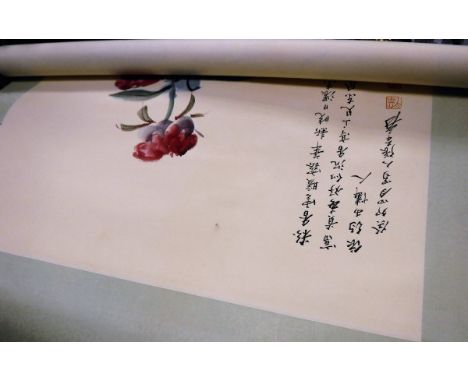 A Chinese watercolour scroll with script to top left hand corner CONDITION REPORTS There is a small pink "smudge" to the top 