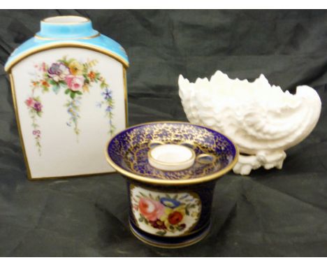 A Coalport style inkwell in cobalt blue with gilt decoration and armorial to the side, initialled "WCW" and with floral spray
