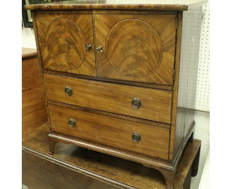 A 19th Century oak Pembroke table together with a Georgian mahogany converted commode, the plain top above two cupboard doors