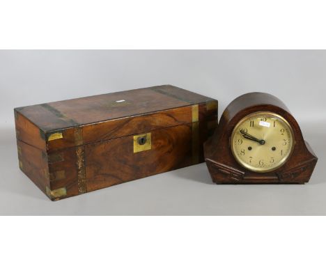 An Art Deco oak cased mantel clock chiming on a coiled gong along with a rosewood writing slope for restoration.