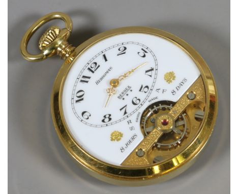 A gold plated Hebdomas Bernex pocket watch with eight day movement the white enamel dial having visible movement.