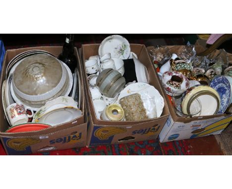 Three boxes of mixed china and glassware to include a lamp shade and wall mirror.
