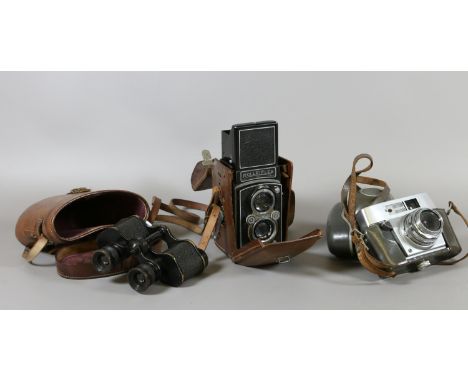 A collection of vintage photographic equipment to include Rolleiflex Compure Rapid camera, Franke Heidecke box camera, Pronto