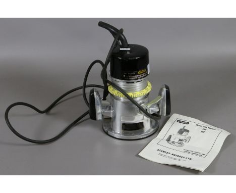 A Stanley 240 volt heavy duty electric router and instruction leaflet.