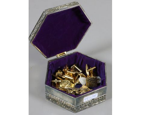 A hexagonal trinket box containing gilt cufflinks and tie pins including Masonic and golfing examples. 