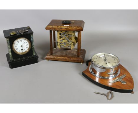Three clocks of various styles to include a 'naked' mantel clock, another with granite style surround and a wall mounted cloc