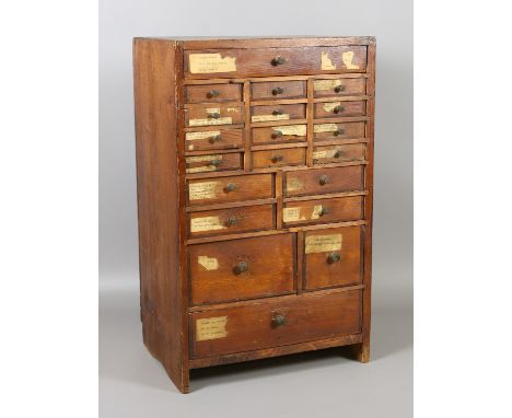 A bank of twenty drawers and contents of horologist / watch makers tools and watch parts / spares, 31.5cm wide, 51.5cm high, 