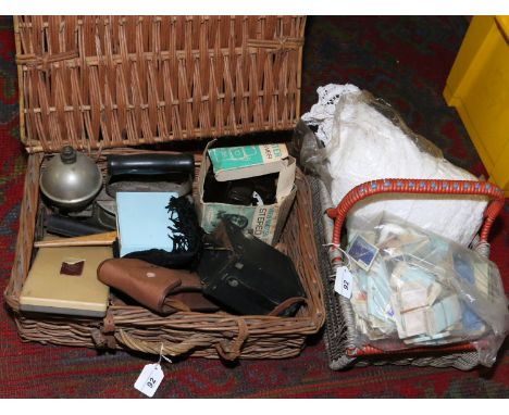 Two baskets of miscellaneous to include vintage iron, stereo viewer, drawing set, number 2 Brownie camera, glass handles, cig