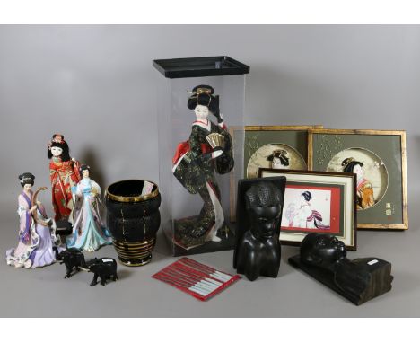 A collection of Japanese tourist ware to include ceramic figurines and a cased traditional dolls etc.