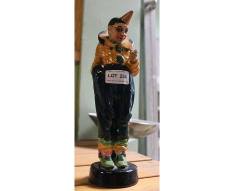 Goldscheider - A pottery glazed clown figure 26 cm high (AF)Condition: a chip to the base, missing finger, the collar restore