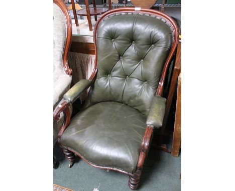 A Victorian mahogany framed open armchair/daily room chair. Green button leather, scroll arms on turned feet.&nbsp;