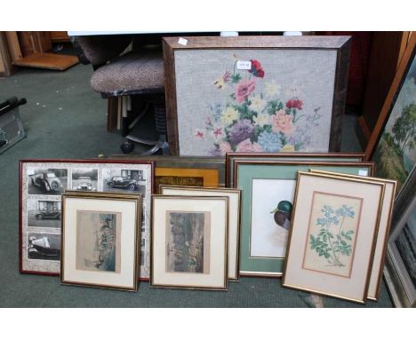 A firescreen with woolwork insert and a selection of prints.