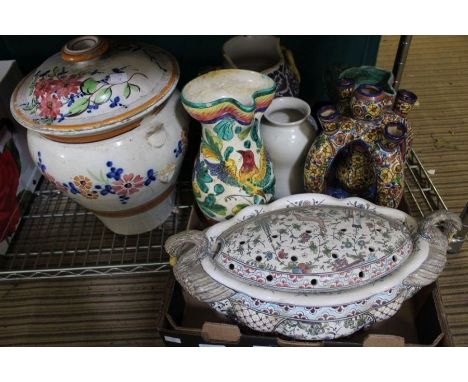 A box containing a selection of Continental china, to include a Majolica examples, candlestick &amp; a large lidded vessel