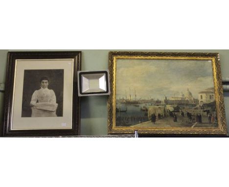 A framed print of Venice and a framed Victorian portrait photograph