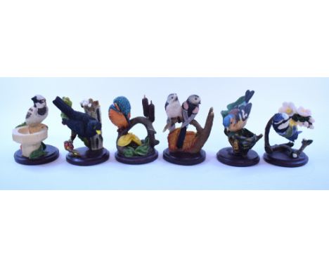 A Royal Worcester Compton & Woodhouse figure, Minnie, a Royal Worcester Goldfinch, 3875, a sterling silver pin dish, other ce
