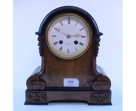 A mantel clock, the 10 cm white dial with Roman numerals, signed Aubert & Co, fitted an eight day movement in a walnut case, 