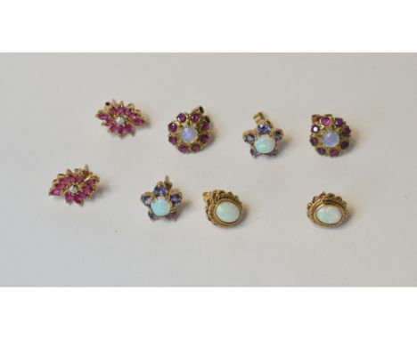 A pair of 9ct gold, opal and tanzanite flowerhead stud earrings, a pair of 9ct gold and opal stud earrings, and two other pai