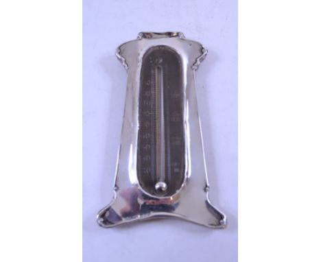 A silver strut table thermometer, 15 cm high