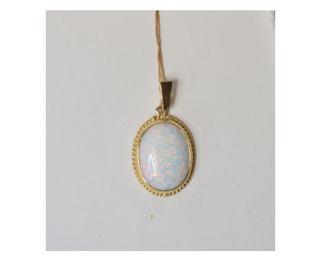 A 9ct gold and Gilson opal pendant, and a 9ct gold chain   Condition report  Modern