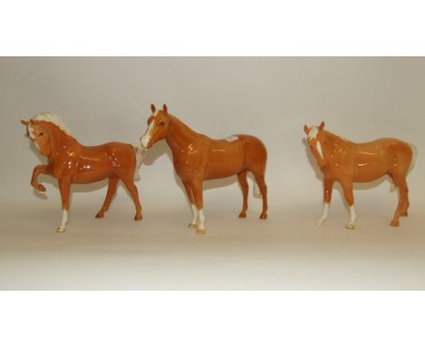 A Beswick Arab Bahram, palomino, 1772, and six other palomino horses, all gloss (7)