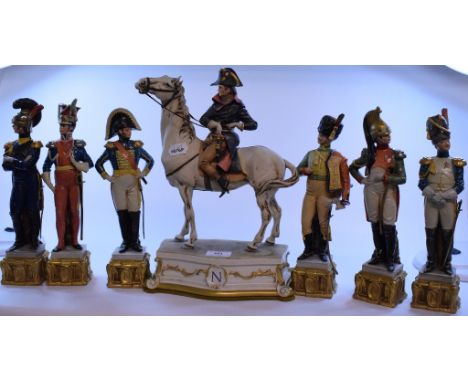 A Capo Di Monte figure of Napoleon, 35 cm high, and six Napoleonic figures of officers (7)   Condition report  Report by GHNo