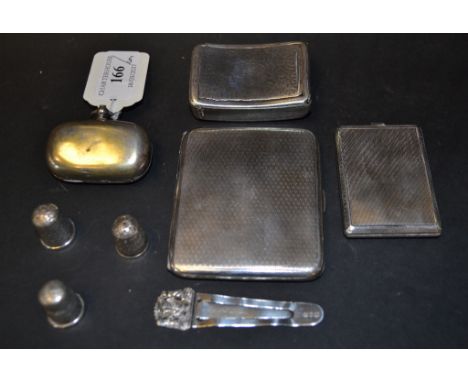 A silver snuff box, with engraved decoration, marks rubbed, a silver cigarette case, a boxwood snuff box, thimbles and other 