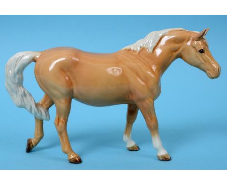 A Beswick Walking Pony, palomino, 1516, gloss (leg glued)  See illustration   Condition report  Report by NGHorse's back righ