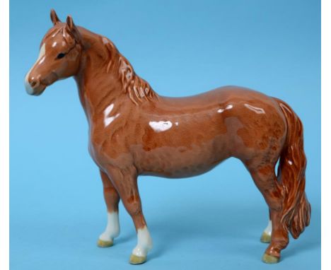 A Beswick Pinto Pony, 1st version, chestnut, 1373, gloss (restored right ear)  See illustration   Condition report  Report by