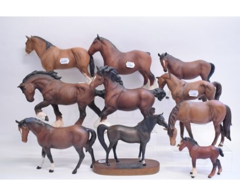 A Beswick Shire Mare, 818, a Clydesdale, A3998 (detached from base), other Beswick and Royal Doulton horses and foals, all br