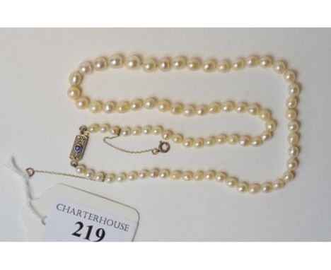 A single strand graduated pearl necklace, with a 9ct gold sapphire and diamond set clasp   Condition report  Condition report