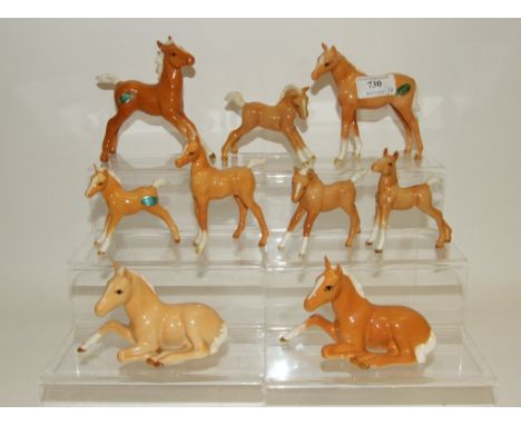 A Beswick Arab Foal, palomino, 1407, another, large, stretched, 1st version, 836 (ears restored), another, larger Thoroughbre