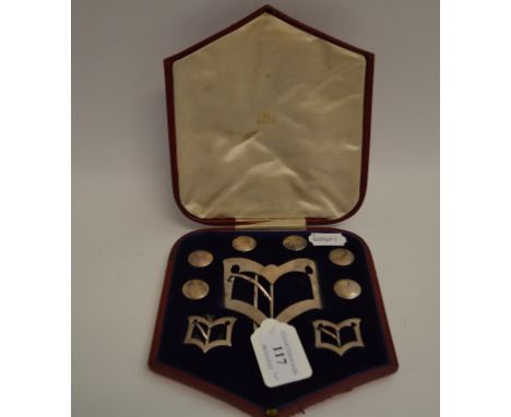 An Edwardian silver button and buckle set, comprising six buttons, one large and two small shoe buckles, initials JC Vickery 