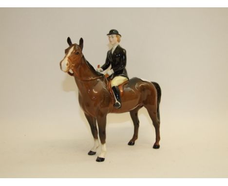 A Beswick Huntswoman, standing, brown, 1730, gloss