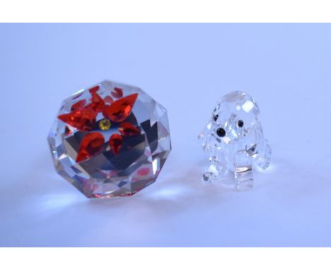 A Swarovski Crystal wine bottle stopper, a Swarovski Crystal dog, both boxed with certificates, a Poole pottery vase, a large