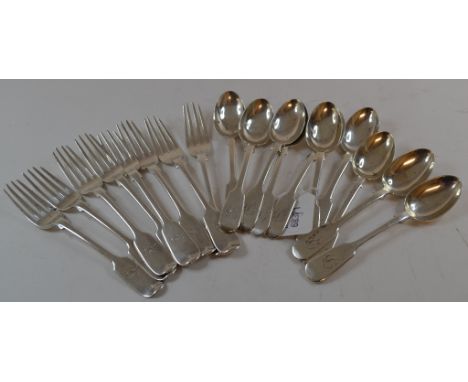 A set of ten silver fiddle pattern teaspoons, initialled, Exeter 1867/72, and a set of eight silver fiddle pattern dessert fo