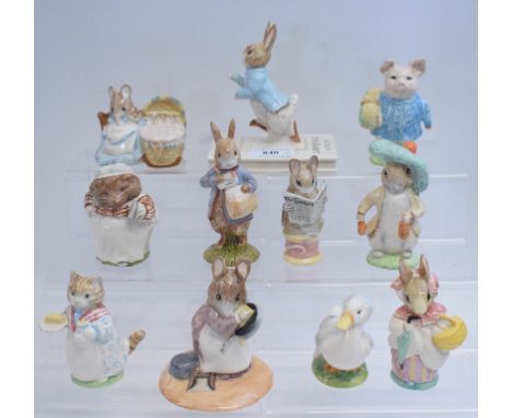 A Beswick Beatrix Potter figure, Peter on his Book, BP-11b, with certificate, two other figures, Hunca Munca, Style Two, and 