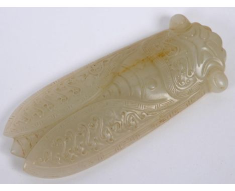 A Chinese white jade cicada, 7 cm long  See illustration