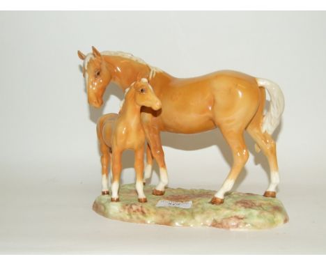 A Beswick Mare and Foal on Base, 2nd version, palomino, 953, gloss (mare with restored ears) 