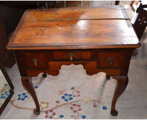 A lowboy, 70 cm wide, an ebonised tripod table, with birdcage support. a mirror, and three other items (6)